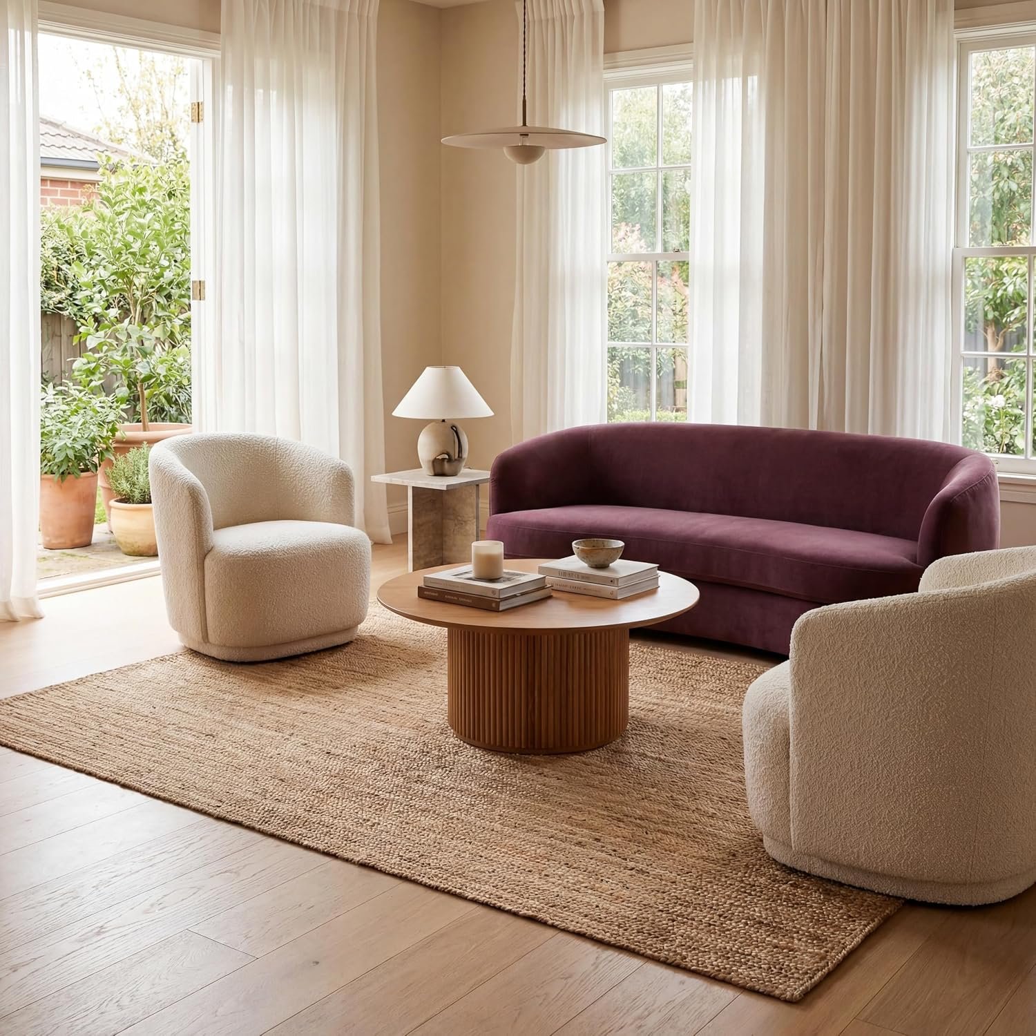 Natural jute flatweave area rug styled in a living room, 5x8